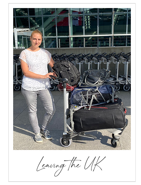 Young woman at the airport with a trolley of luggage in a polaroid frame